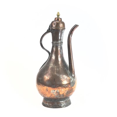 Lot 1021 - An Islamic tinned copper ewer, 19th century,...