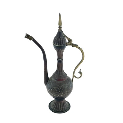 Lot 1022 - An Islamic copper ewer, 19th century, height...