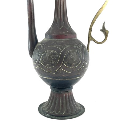 Lot 1022 - An Islamic copper ewer, 19th century, height...