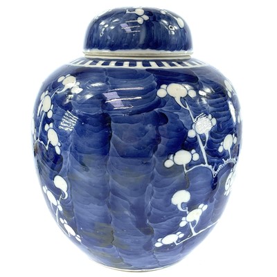 Lot 9 - A Chinese blue and white porcelain prunus...