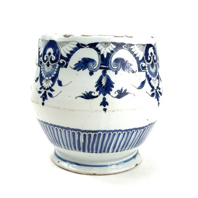 Lot 924 - An unusual shaped delft bowl decorated in blue...