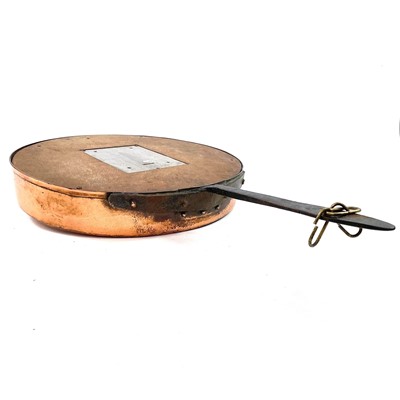 Lot 183 - A 19th century copper pan adapted to a wall clock.