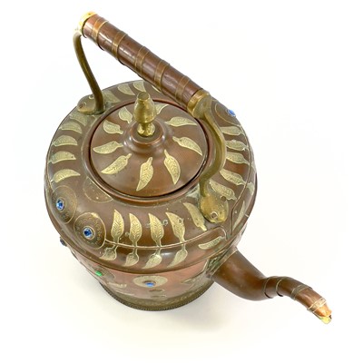 Lot 1033 - An Indian copper kettle, circa 1900, height...