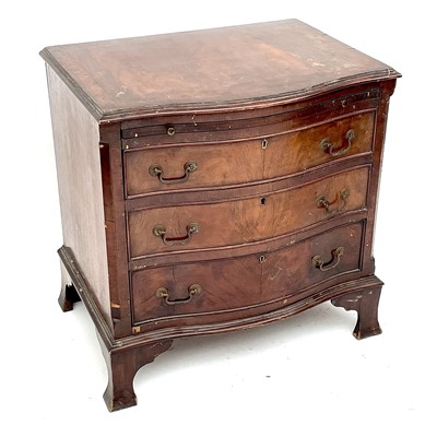 Lot 1816 - A walnut serpentine front chest, 20th century,...