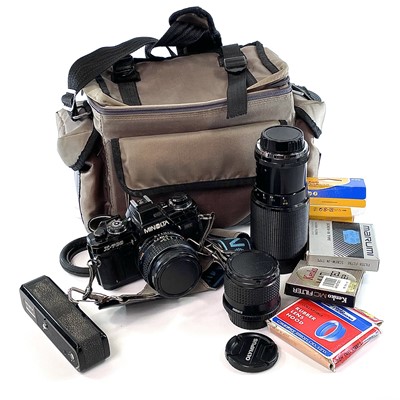 Lot 192 - Minolta X 700 SLR camera and accessories...