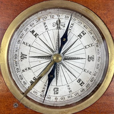 Lot 135 - A 19th century compass with printed card dial...