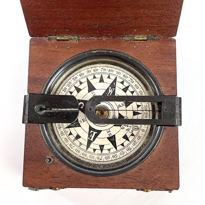 Lot 157 - A 19th century travel compass with a printed...
