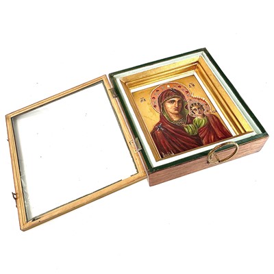 Lot 43 - A Russian icon, painted with the Mother of God,...