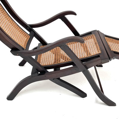 Lot 1814 - A teak steamer chair, circa 1900, with rattan...