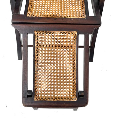 Lot 1814 - A teak steamer chair, circa 1900, with rattan...