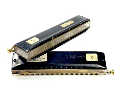 Lot 269 - Two cased 'Hohner' Super 64X 16 hole chromatic harmonicas.