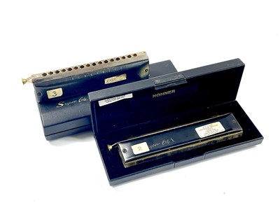 Lot 269 - Two cased 'Hohner' Super 64X 16 hole chromatic harmonicas.