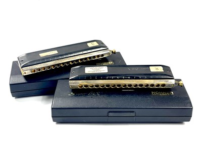 Lot 269 - Two cased 'Hohner' Super 64X 16 hole chromatic harmonicas.