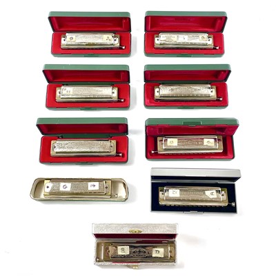 Lot 268 - A collection of nine chromonica harmonicas.