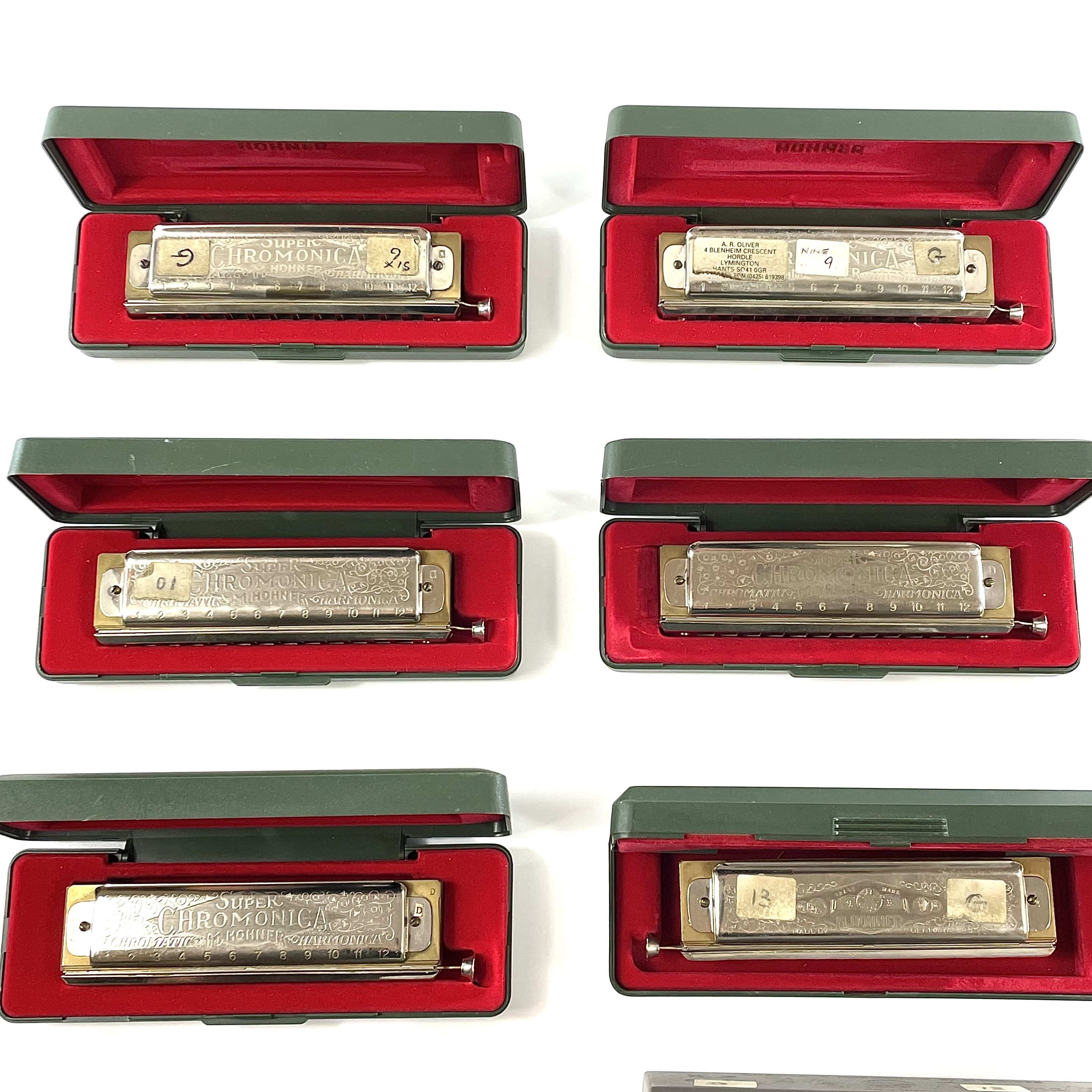 Lot 268 - A collection of nine chromonica harmonicas.