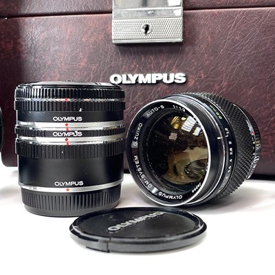 Lot 72 - Three Olympus OM-system lenses, a G.Zuiko auto-...