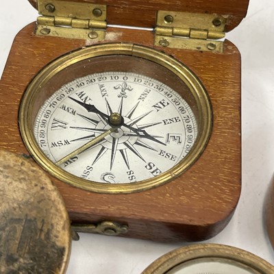 Lot 178 - A 19th century compass with a printed card...