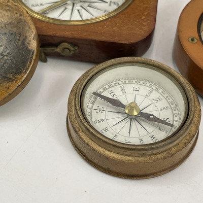 Lot 178 - A 19th century compass with a printed card...