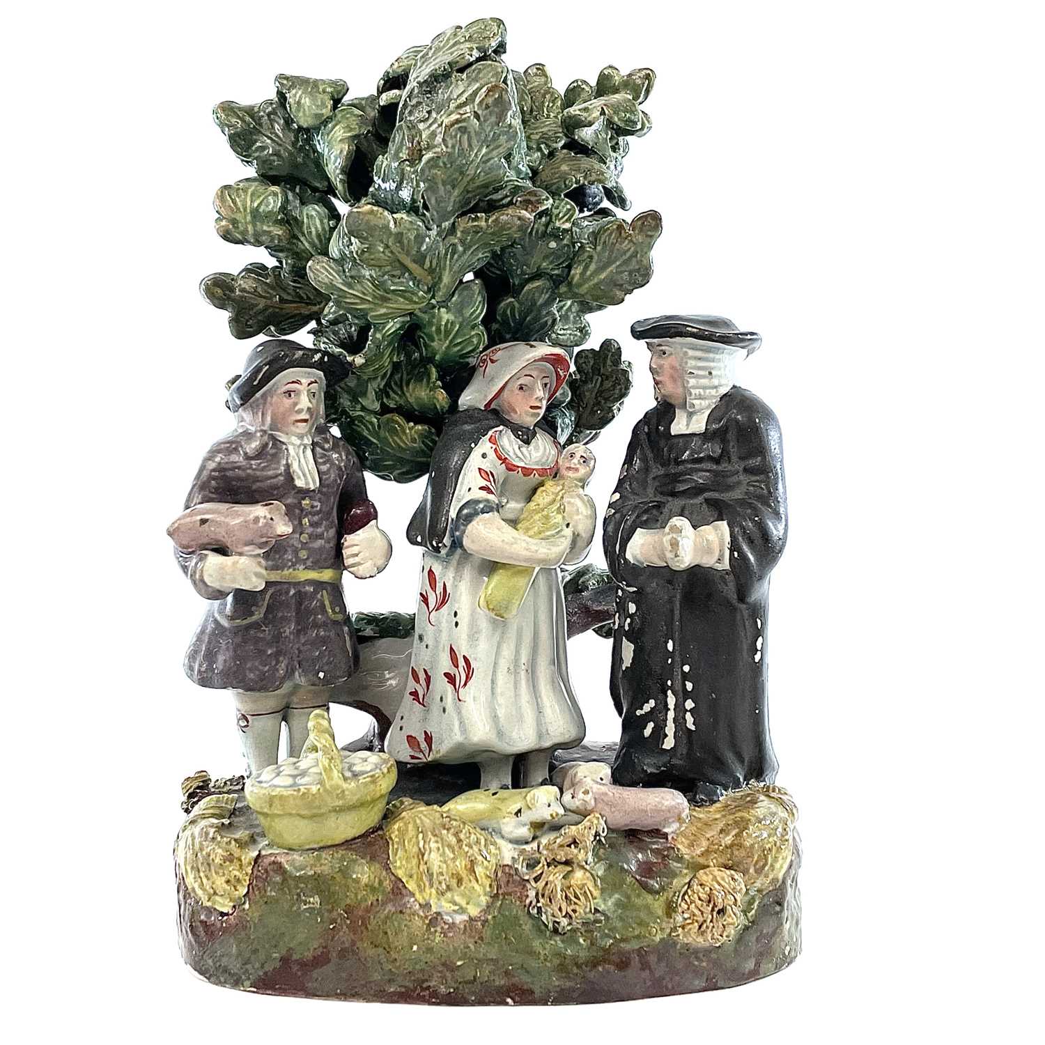 Lot 872 - A Staffordshire pottery Tithe Pig group,