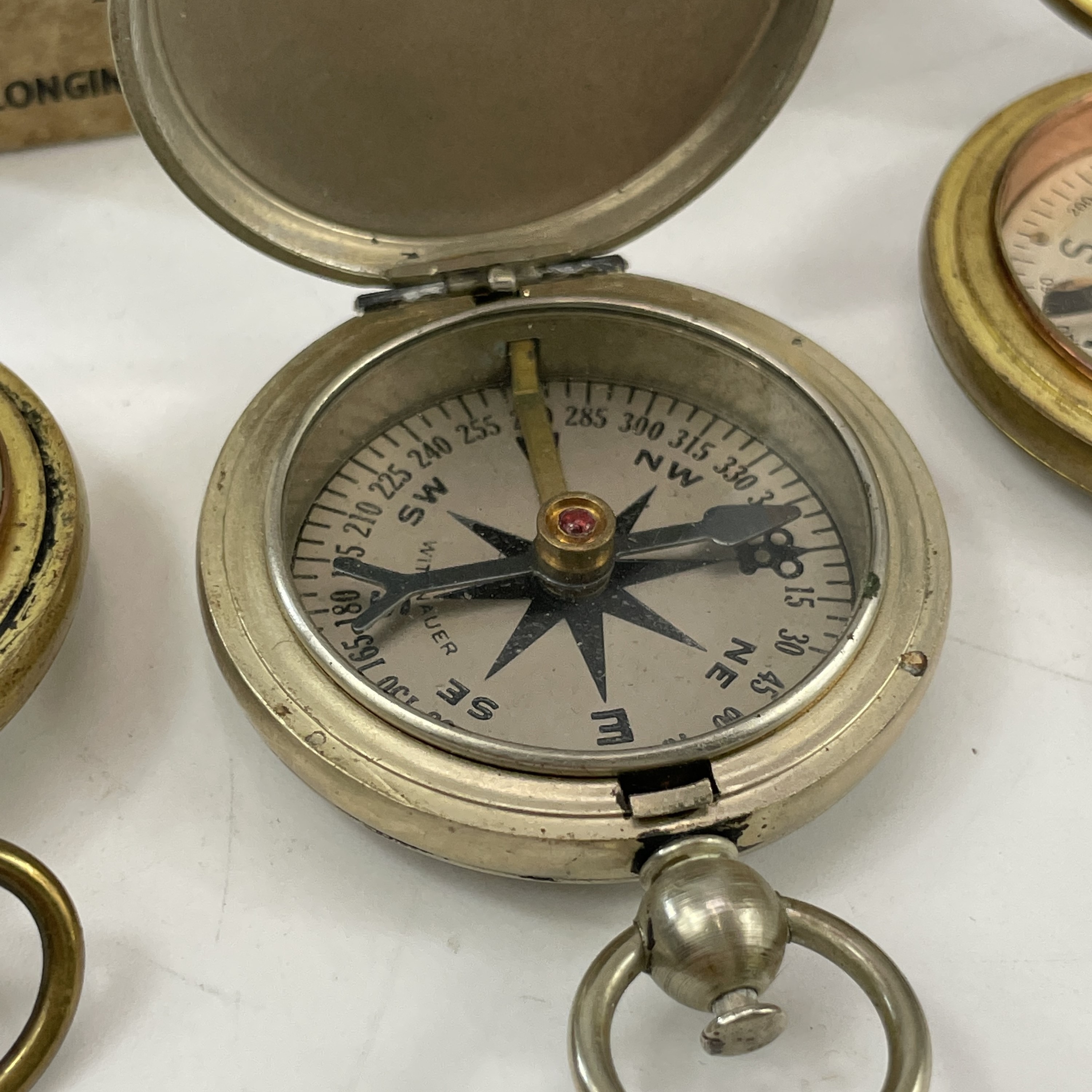 Lot 217 A WWII Longines Wittnauer compass with