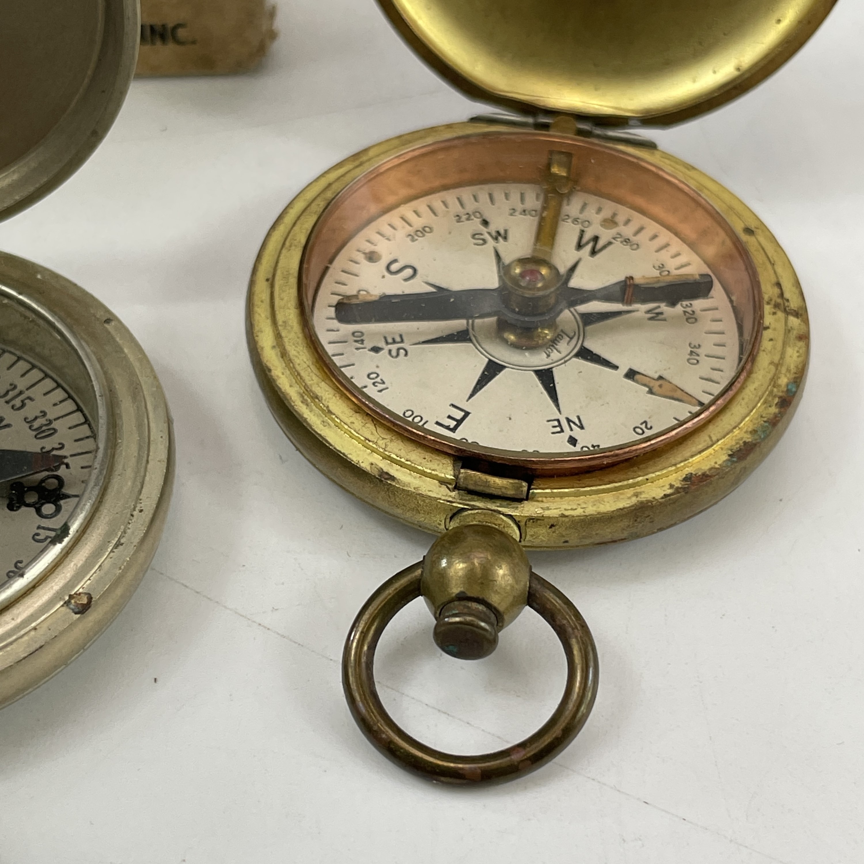 Lot 217 A WWII Longines Wittnauer compass with