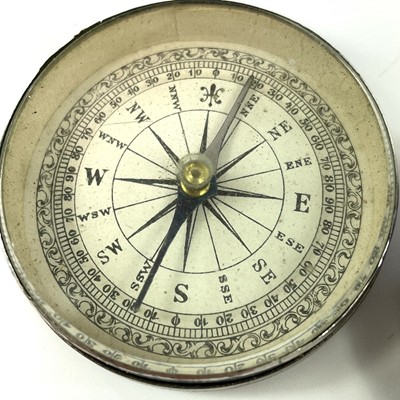 Lot 183 - A 19th century nickel compass with a printed...