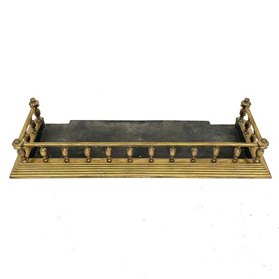 Lot 139 - A late Victorian brass fender, of...