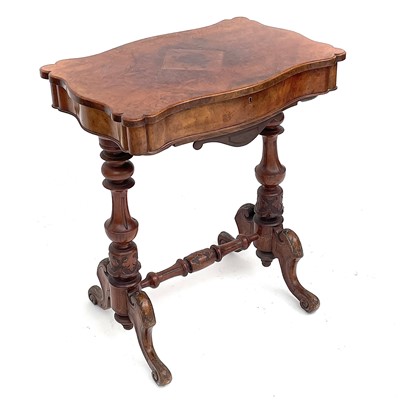 Lot 1809 - A Victorian walnut work table, with a rising...