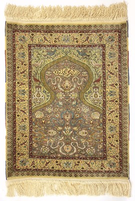 Lot 1205 - An exceptionally fine Hereke silk rug.