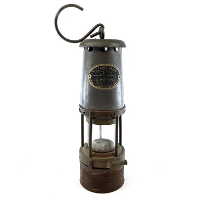 Lot 145 - A Victor Kent Wolf safety miner's lamp, height...