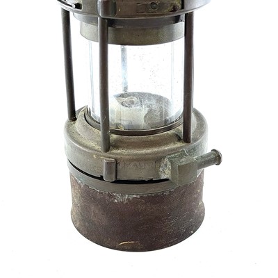 Lot 145 - A Victor Kent Wolf safety miner's lamp, height...