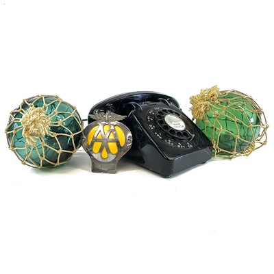 Lot 106 - A 1960s black GPO telephone, model number 706L...