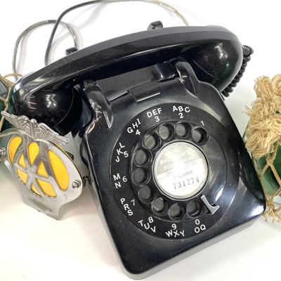 Lot 106 - A 1960s black GPO telephone, model number 706L...