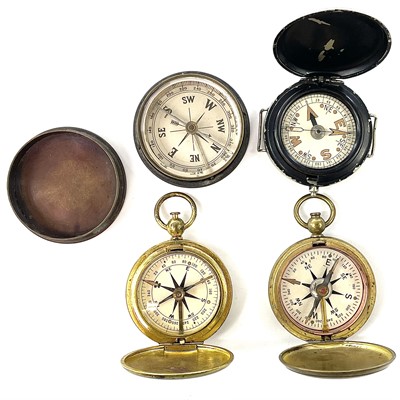 Lot 179 - An early 20th century brass compass with cover,...