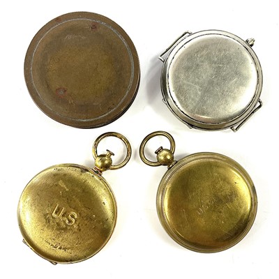 Lot 179 - An early 20th century brass compass with cover,...