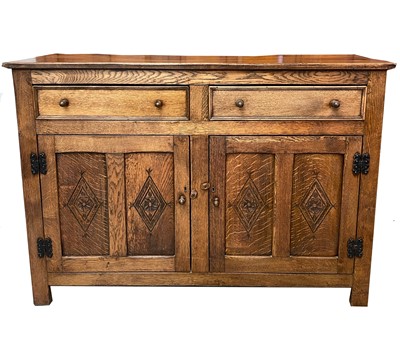 Lot 1866 - An oak sideboard, mid 20th century in the...