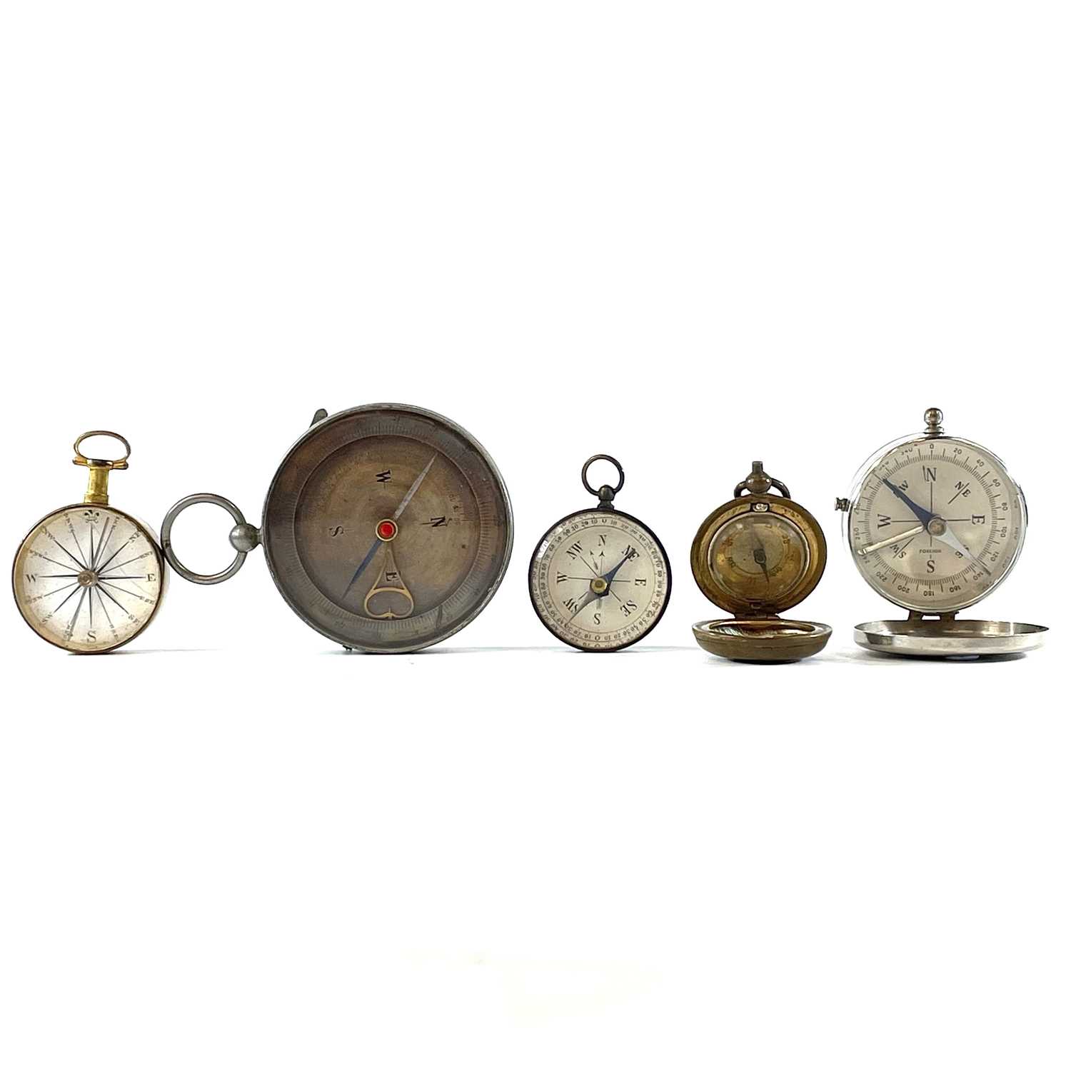 Lot 95 - A 19th century brass compass with an enamel...