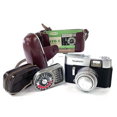 Lot 243 - A Voigtländer Vito C camera in fitted leather...