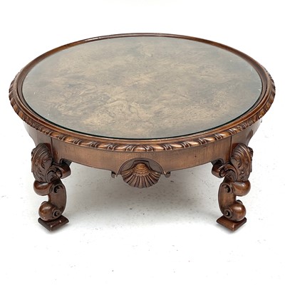 Lot 1880 - A circular walnut coffee table, mid 20th...