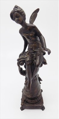 Lot 167 - A bronze figure of a fairy seated on a column,...