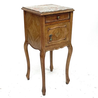 Lot 1885 - A French walnut marble topped bedside cupboard,...