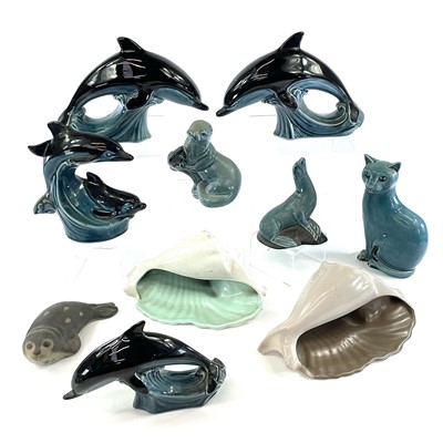 Lot 909 - A Poole pottery dolphin figure together with...