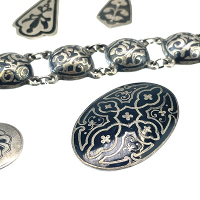 Lot 229 - A Russian silver and niello semi spherical bracelet.
