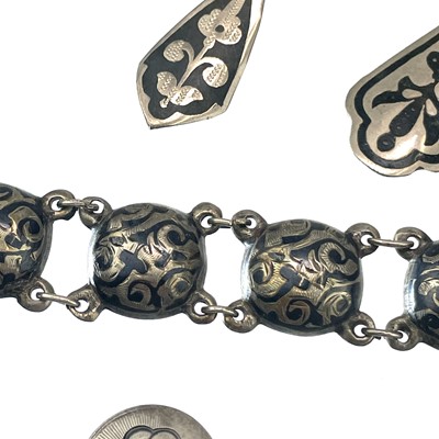 Lot 229 - A Russian silver and niello semi spherical bracelet.