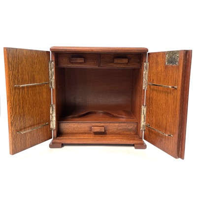 Lot 38 - An oak table cabinet, early 20th century.
