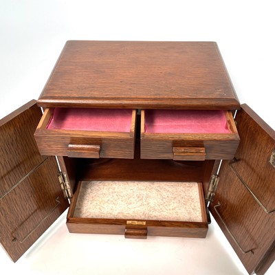 Lot 38 - An oak table cabinet, early 20th century.