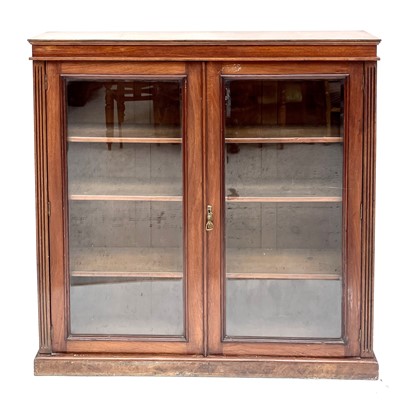 Lot 1909 - A late Victorian walnut glazed bookcase, the...