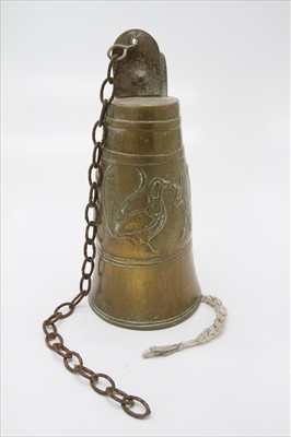 Lot 210 - A Middle Eastern heavy brass bell decorated...