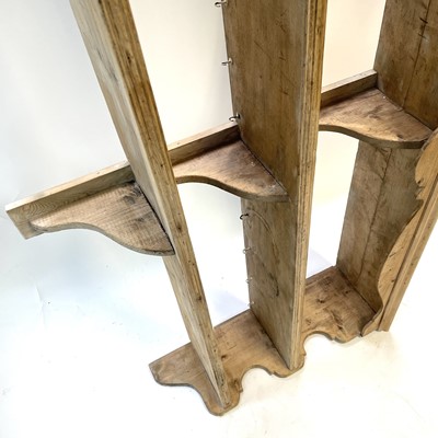 Lot 175 - A set of pine hanging shelves