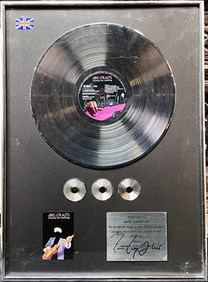 Lot 23 - Gold Disc presented to Mark Knopfler.